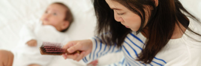 Everything you need to know about postpartum hair loss