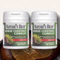 Two bottles of Nature's Best Horse Chestnut Complex on a wooden surface.