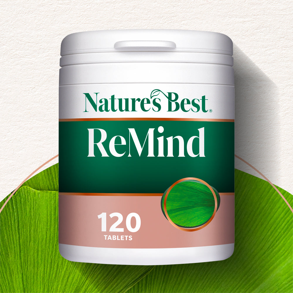 Nature's Best ReMind supplement container on a green leaf background
