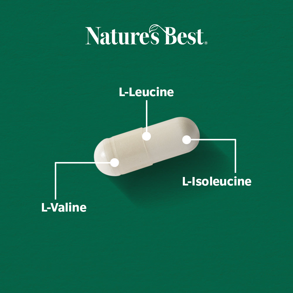 Capsule labeled with 'L-Leucine', 'L-Isoleucine', and 'L-Valine' on a green background with 'Nature's Best' branding.