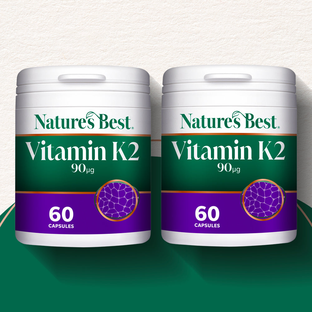 Two containers of Nature's Best Vitamin K2 on a white and green background