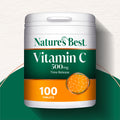 Nature's Best Vitamin C 500 mg Time Release supplement container on a green and white background