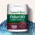 Nature's Best Pulse Q10 supplement container on a textured white and blue background
