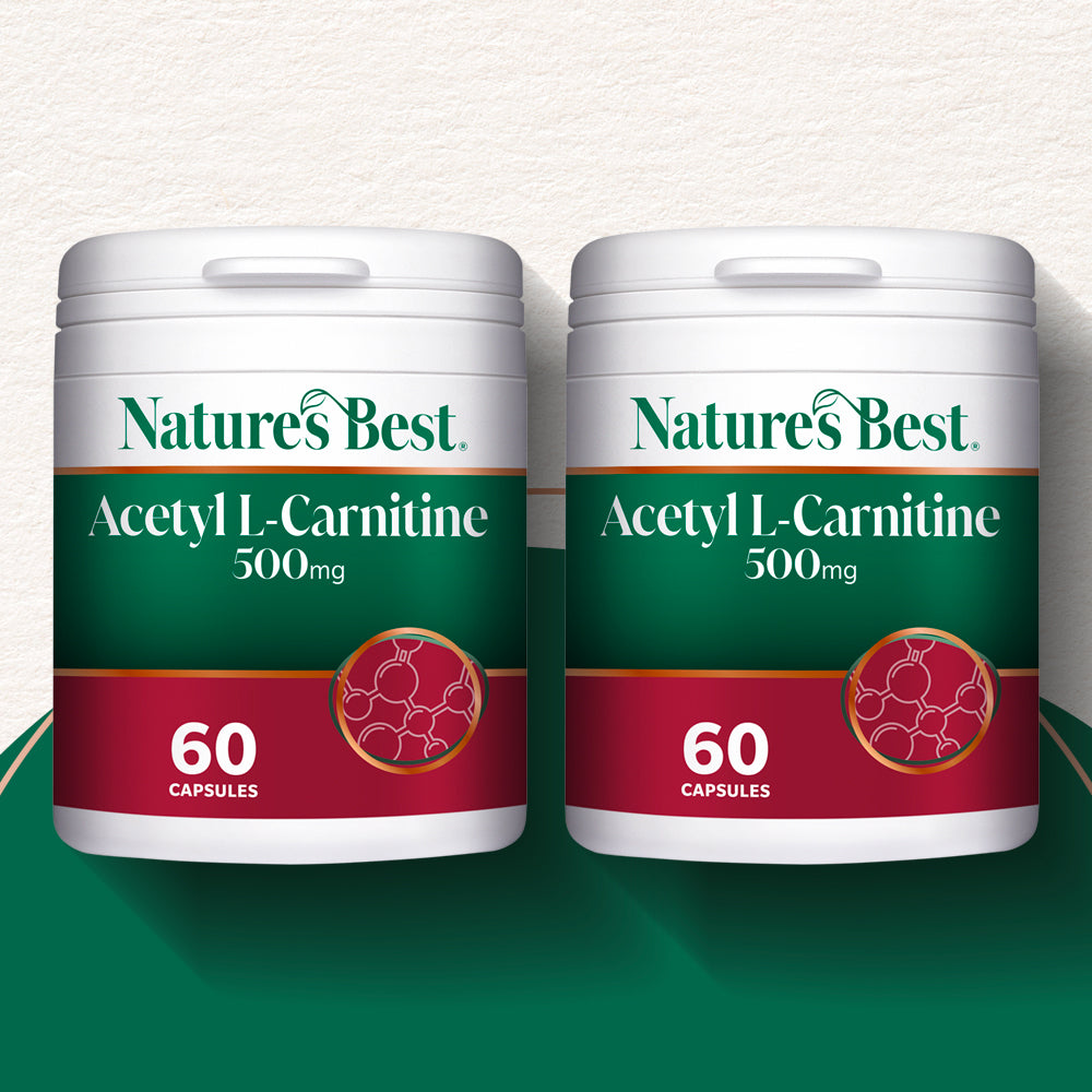 Two containers of Nature's Best Acetyl L-Carnitine 500mg capsules on a green and white background.