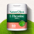 Nature's Best L-Theanine 200mg supplement container on a green leaf background